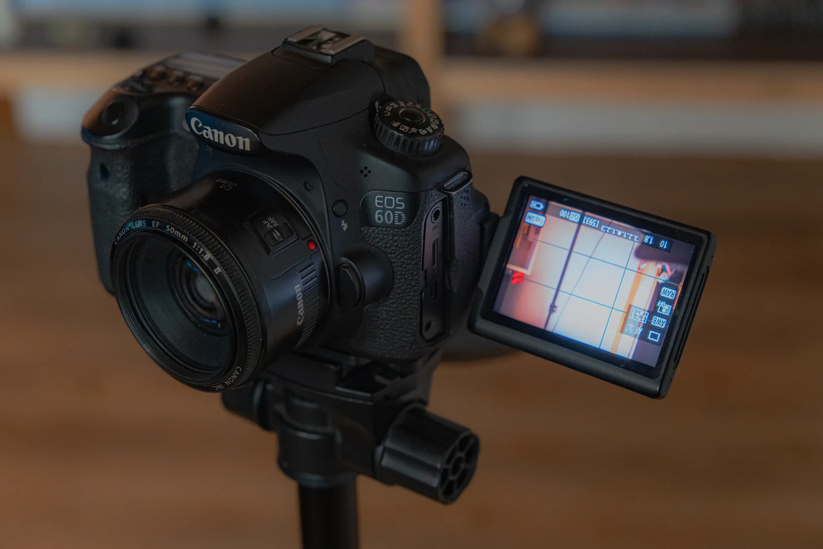 Canon 60D on a tripod with its articulating screen open in my current studio in Japan