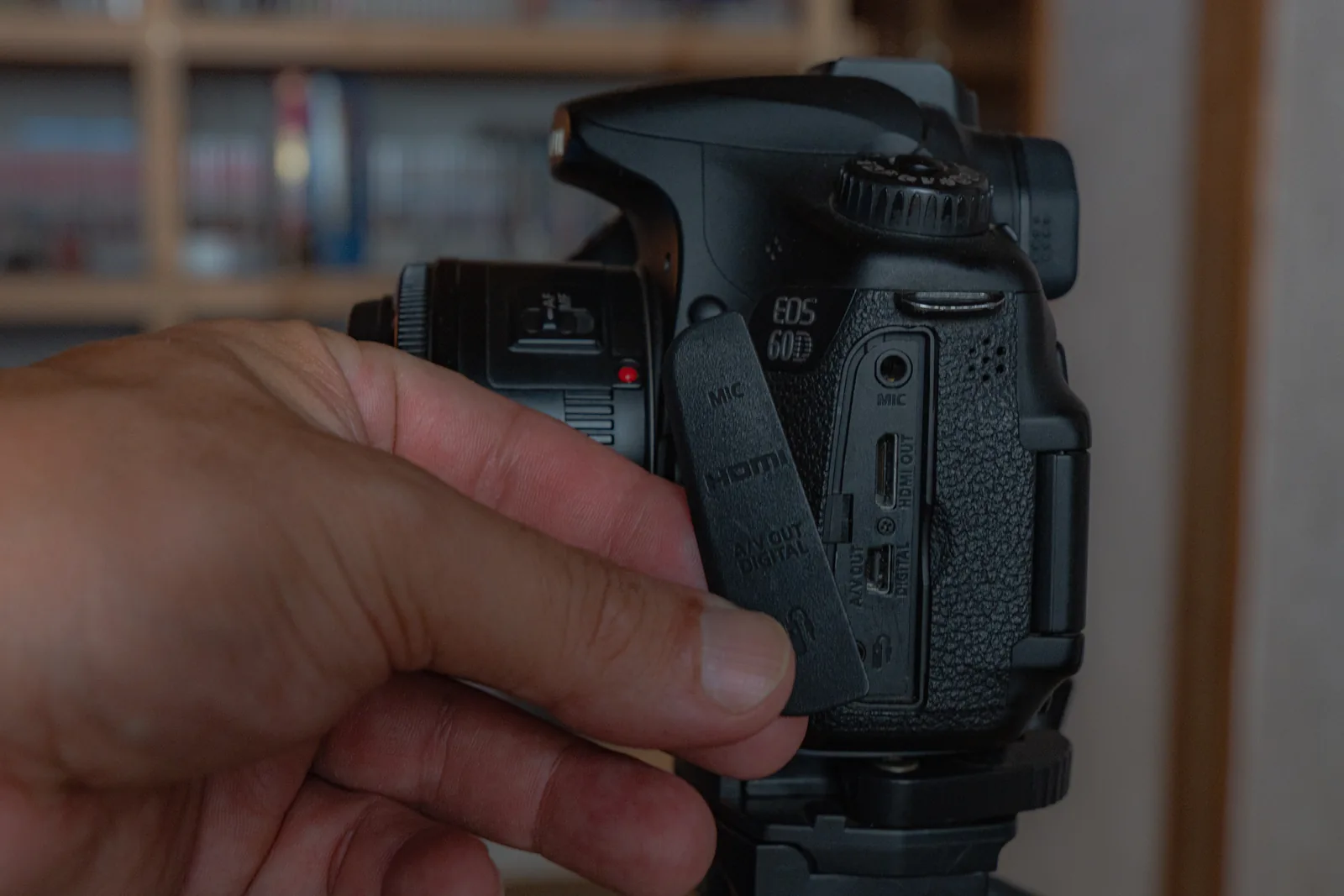 Worn Canon 60D port cover after 15 years of use
